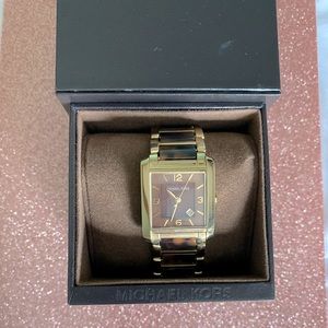 Michael Kors Women’s Tortoise Link Square watch.